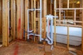 New under construction bathroom interior with interior framing of new house under construction Royalty Free Stock Photo