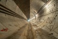 New, under construction, empty concrete round deep subway tunnel made of concrete blocks Royalty Free Stock Photo