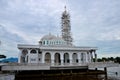 New under construction Islamic floating mosque with two domes at Sarawak river waterfront Kuching Malaysia