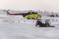 New Urengoy, YaNAO, North of Russia. Helicopter UTair and Konvers avia in the local airport on the service. January 06, 2016 Royalty Free Stock Photo