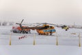 New Urengoy, YaNAO, North of Russia. Helicopter UTair and Konvers avia in the local airport on the service. January 06, 2016 Royalty Free Stock Photo