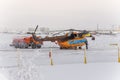 New Urengoy, YaNAO, North of Russia. Helicopter UTair and Konvers avia in the local airport on the service. January 06, 2016 Royalty Free Stock Photo