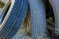 New and used car winter tire before changing tires Royalty Free Stock Photo