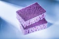 New violet cleaning sponges on white surface