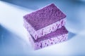 New violet cleaning sponges on white surface Royalty Free Stock Photo