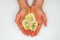 New virtual money: Golden Bitcoins in Hand / White Background / The future Cryptocurrency / Business and Trading concept. Royalty Free Stock Photo