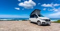 The new 2021 Volkswagen VW Transporter Camping Van T6.1 California Ocean in the coastal Nature Royalty Free Stock Photo