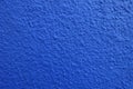 New wall with coarse blue roughcast finish Royalty Free Stock Photo