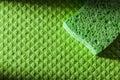 New washing sponge on dishcloth Royalty Free Stock Photo