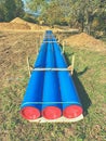 New water pipe at trench, spare part. Service company prepare Royalty Free Stock Photo