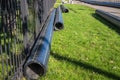 New water pipes after replacement near the old house. Pipeline. Replacement of the pipeline. New pipes on the road in the city Royalty Free Stock Photo