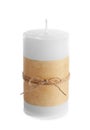 New wax candle decorated with parchment Royalty Free Stock Photo