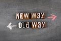 New Way and Old Way concept. Chalk arrows on a dark chalk board Royalty Free Stock Photo