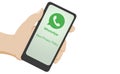 New whatsapp privacy policy with green lettering on hand hold smartphone isolated. Cartoon flat illustration of a phone about new