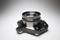 New wheel bearing in a metal housing on a black-white gradient background. New car suspension parts Royalty Free Stock Photo