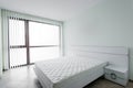 New white bedroom with double bed Royalty Free Stock Photo