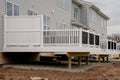 new white deck from the back of the house Royalty Free Stock Photo