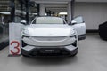 new white electric crossover Polestar 3 Swedish company Polestar in showroom, trends in use EV in contemporary Europe,