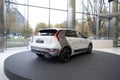 new white electric Kia Niro EV Premium, South Korean e-Niro in showroom, trends in use EV in contemporary Europe, technological