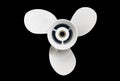 New white screw for a motor boat. Three bladed propeller isolated over black background. Outboard engine propeller isolated Royalty Free Stock Photo