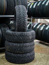 New winter tire set with studs at tire shop Royalty Free Stock Photo