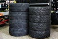 New winter tire sets with studs and without studs at tire shop Royalty Free Stock Photo