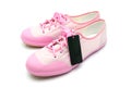 New woman pink sneaker with tag Royalty Free Stock Photo