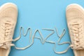 New women sneakers with laces in mazy text.