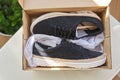 New womens black natural suede sneakers in box at home