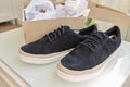 New womens black natural suede sneakers in box at home