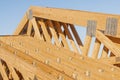 New wood pine trusses with metal joist hangers attached