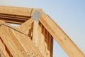 New wood pine trusses with metal joist hangers attached Royalty Free Stock Photo