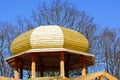 New wooden building frame with a round domed tower