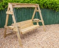 New wooden garden swing bench Royalty Free Stock Photo