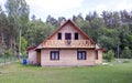 New wooden house in village Royalty Free Stock Photo