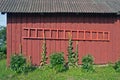 New wooden ladder on barn wall Royalty Free Stock Photo