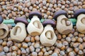 Wooden nutcrackers and hazelnuts in market