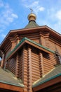 New wooden Orthodox church, dome with a cross and blue sky. Russia Royalty Free Stock Photo