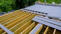 A new wooden, timber deck being constructed. it is partially completed can be seen on the decking. Royalty Free Stock Photo