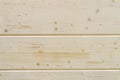 A new wooden wall made of thick timber. background. Royalty Free Stock Photo