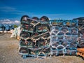 New, wrapped lobster pots or creels on pallets at a delivery yard on the island of Scalpay in the Outer Hebrides, Scotland, UK. Royalty Free Stock Photo