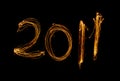 New Year 2011 sparklers isolated on black Royalty Free Stock Photo