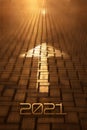 2021 New year and arrow on the road background. Forward New Year concept with arrow and 2021 number at sunset. Concept Royalty Free Stock Photo