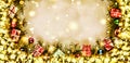 New Year. Background, frame of Christmas tree branches and Christmas decorations. Golden snow. Free space for text. Royalty Free Stock Photo