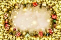 New Year. Background, frame of Christmas tree branches and Christmas decorations. Golden snow. Free space for text. Royalty Free Stock Photo