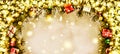 New Year. Background, frame of Christmas tree branches and Christmas decorations. Golden snow. Free space for text. Royalty Free Stock Photo