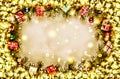 New Year. Background, frame of Christmas tree branches and Christmas decorations. Golden snow. Free space for text. Royalty Free Stock Photo