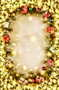 New Year. Background, frame of Christmas tree branches and Christmas decorations. Golden snow. Free space for text.