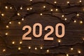 New year background with garland and 2020 conceptual text