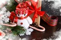 New Year background with gifts, sweets and a snowman. Royalty Free Stock Photo